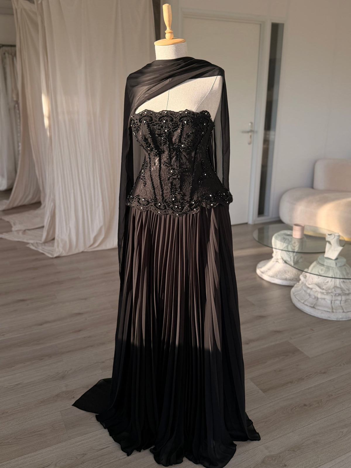 Pleated Gown with Embellished Corset and Cape