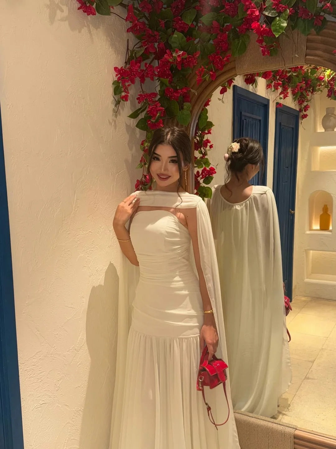 Ruched Strapless Mermaid Gown with Flowing Cape