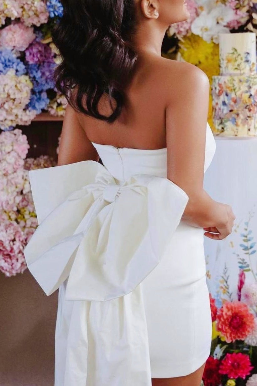 Strapless Ruched Mini Dress with Statement Bow Train