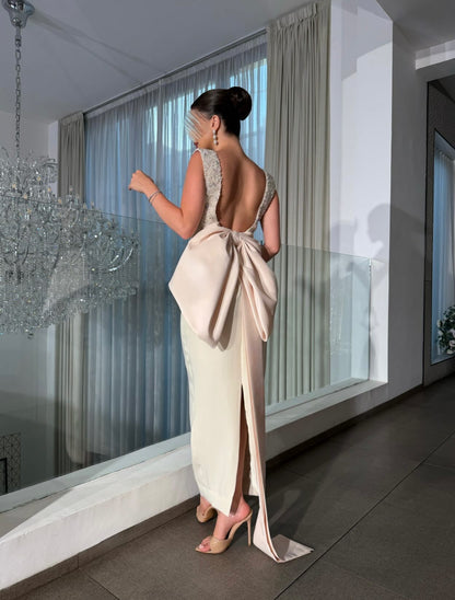 Elegant Beaded Scoop Neck Dress with Statement Back Bow