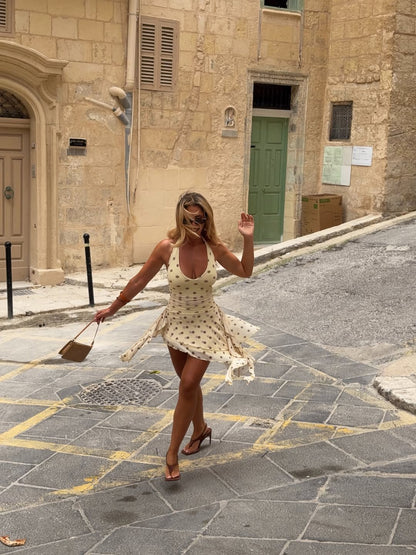 Polka Dot Halter Mini Dress with Ruffled Hem