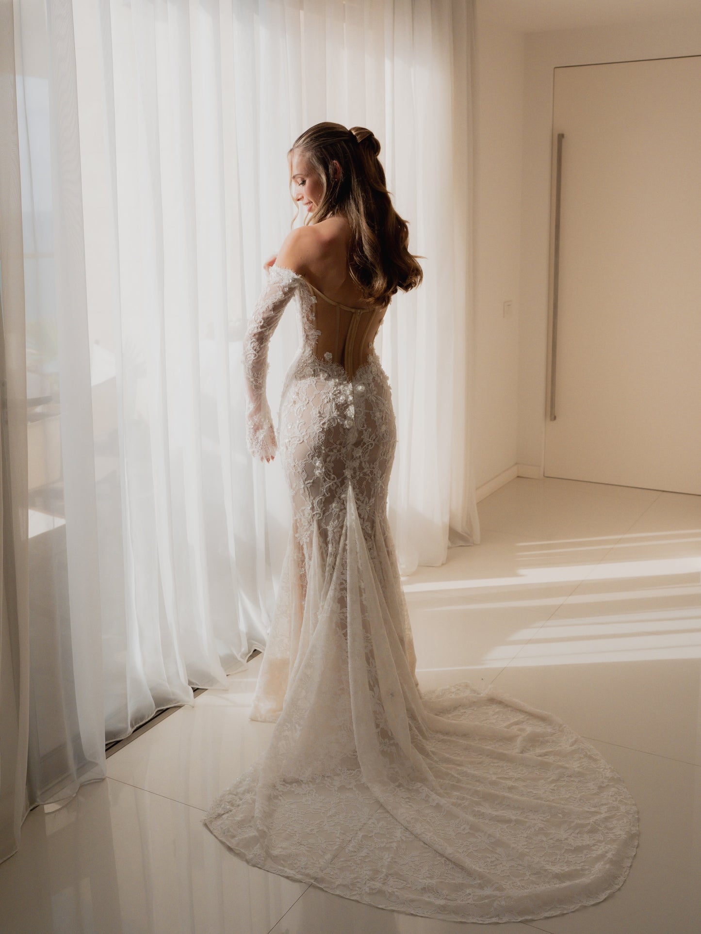 Off-the-Shoulder Long Sleeve Lace Mermaid Wedding Dress