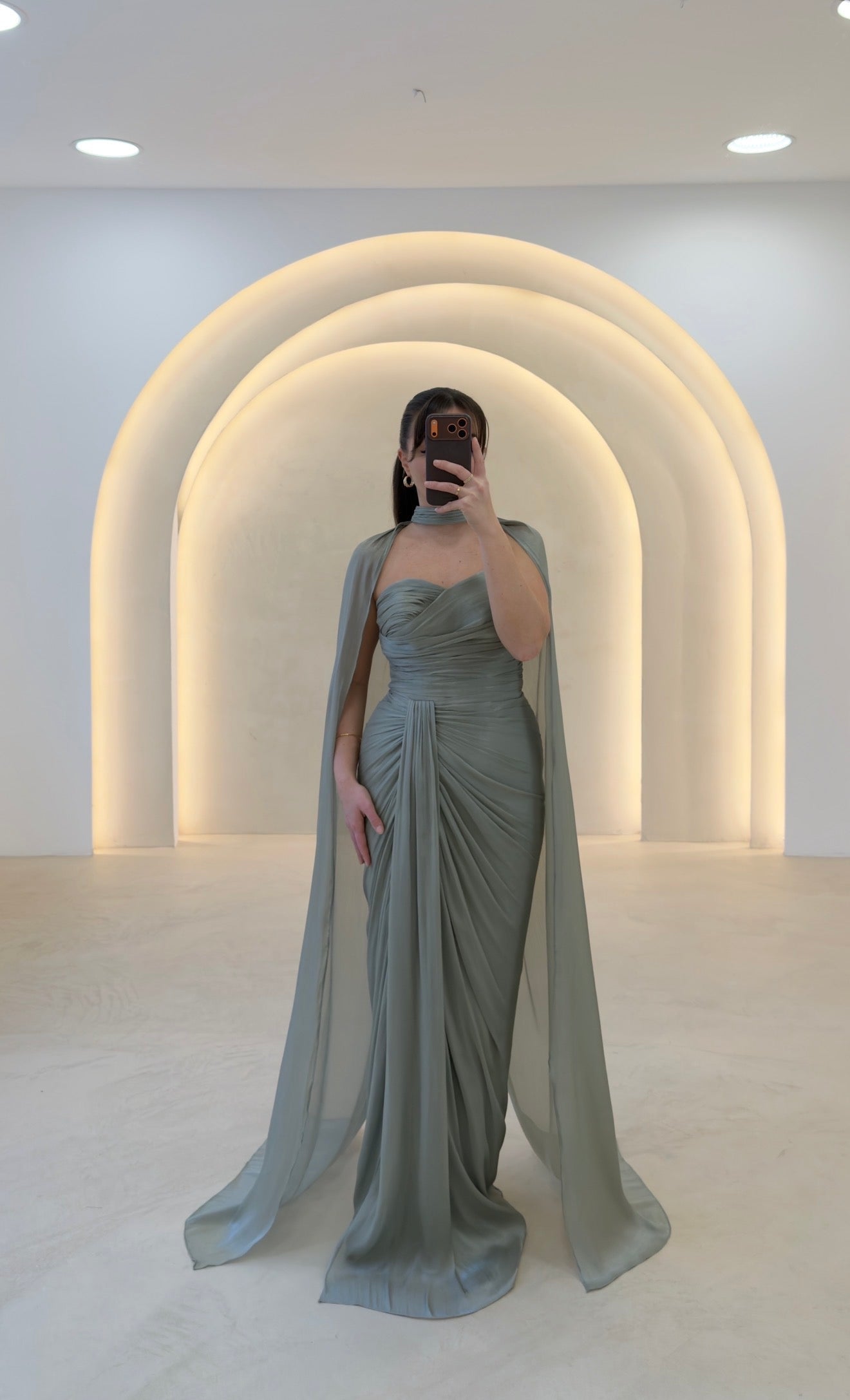 Strapless Ruched Evening Gown with Dramatic Cape