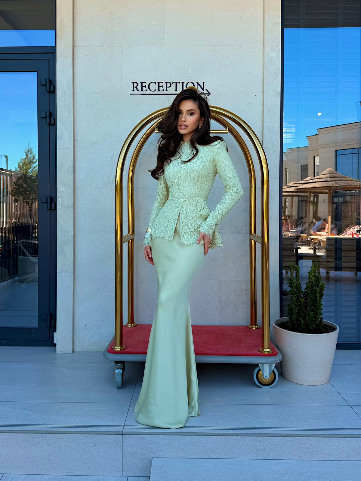 Long Sleeve Lace Peplum Evening Gown