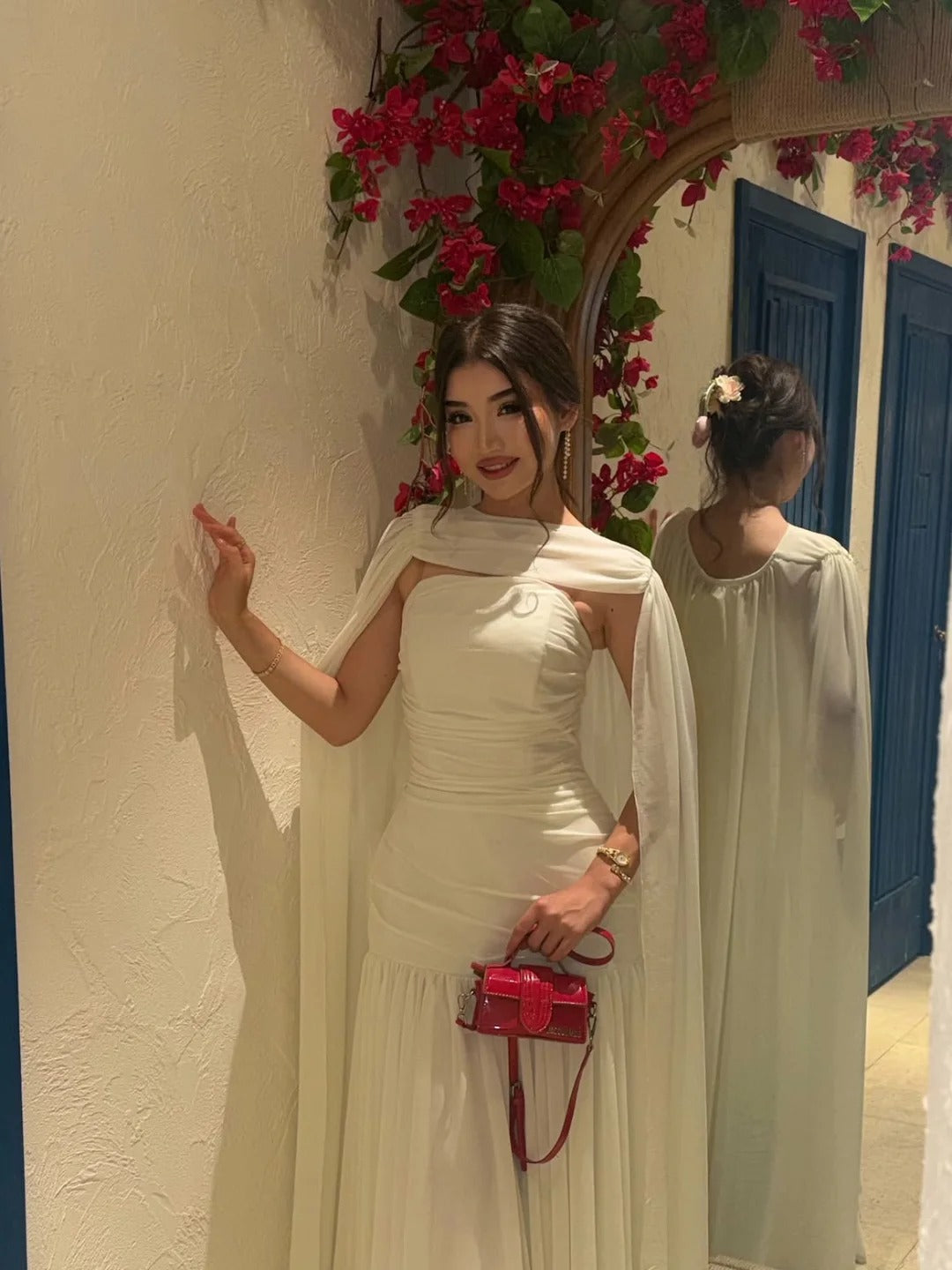 Ruched Strapless Mermaid Gown with Flowing Cape