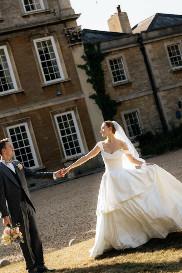 Tiered Ball Gown Wedding Dress with Draped Bodice