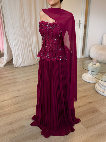Pleated Gown with Embellished Corset and Cape