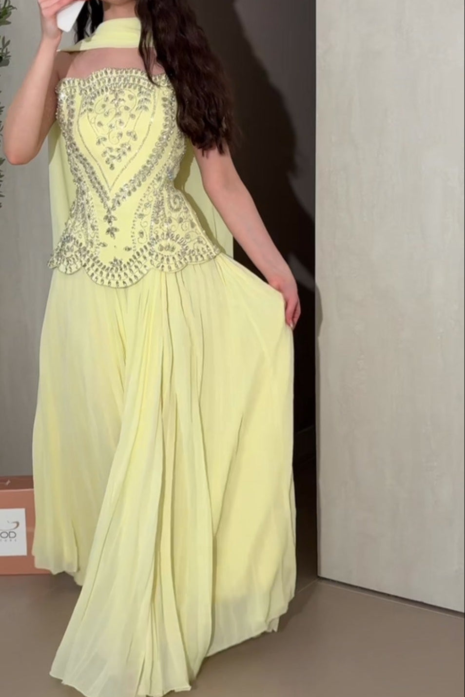 Beaded Halter-Neck Evening Gown with Pleated Skirt