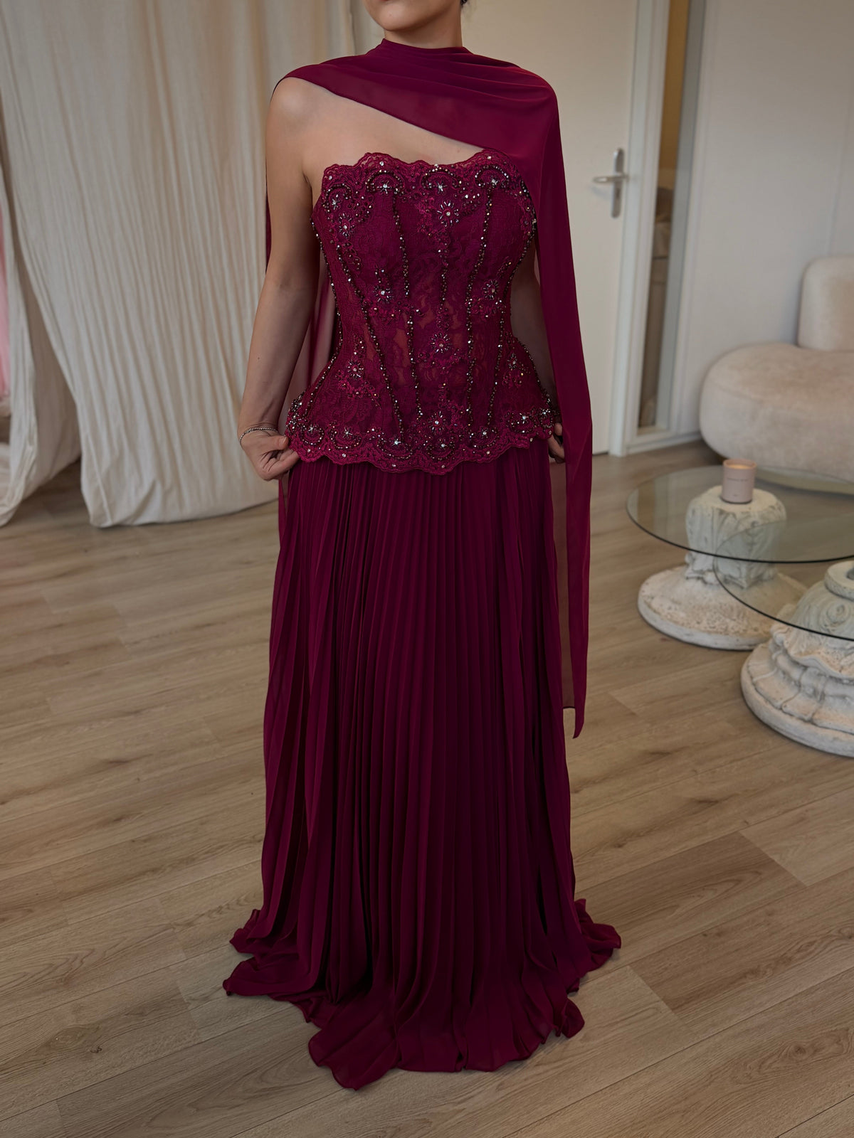 Pleated Gown with Embellished Corset and Cape