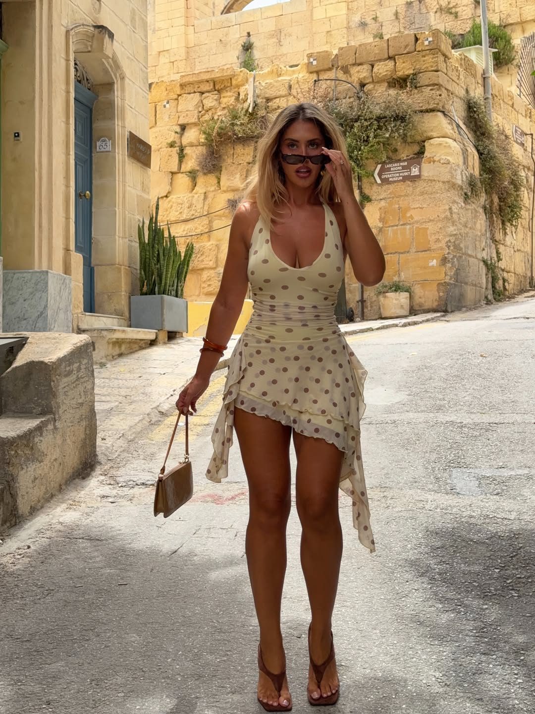 Polka Dot Halter Mini Dress with Ruffled Hem