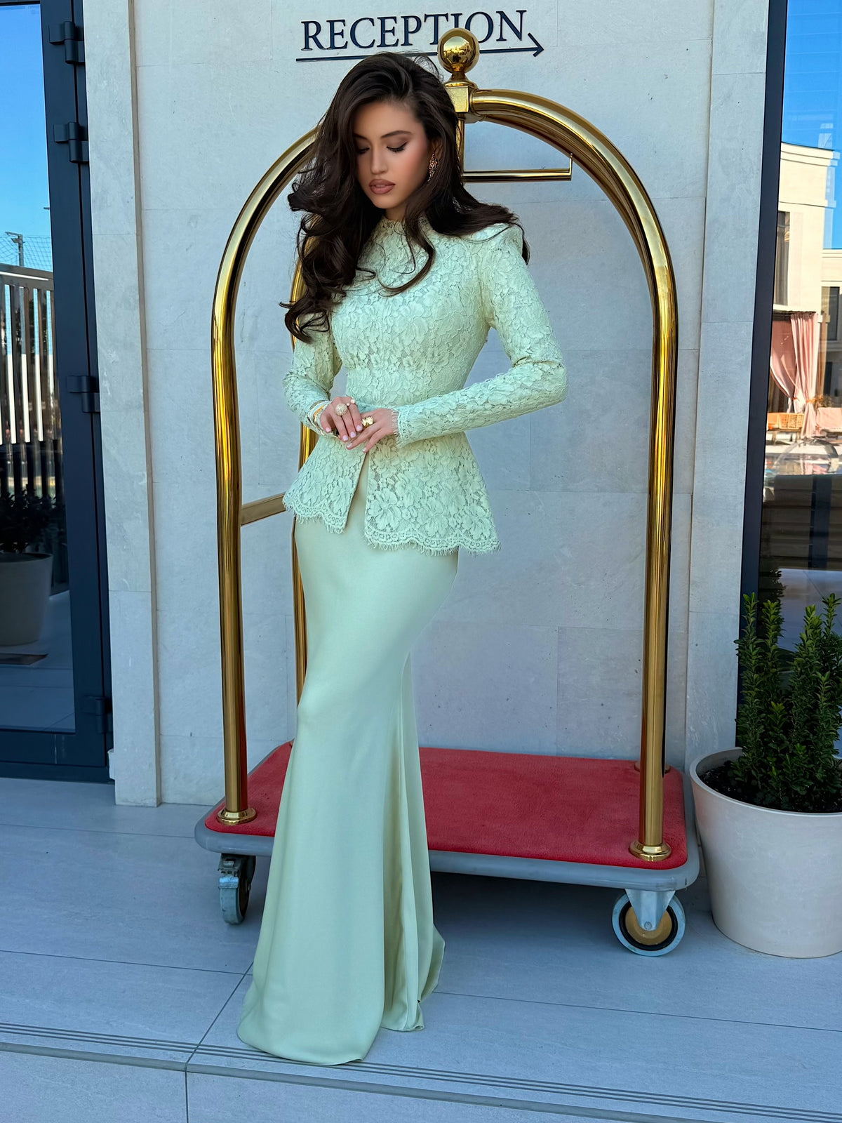 Long Sleeve Lace Peplum Evening Gown