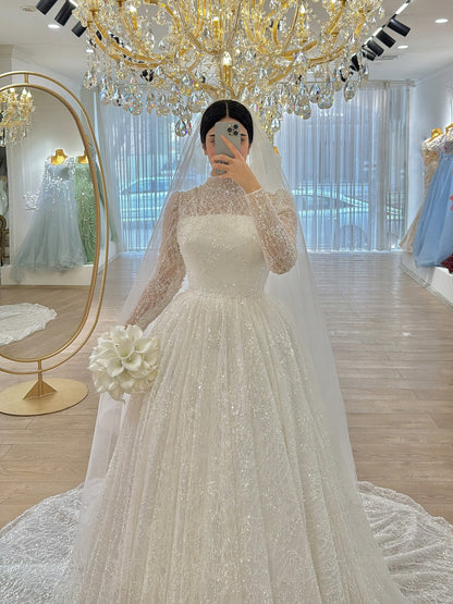 Illusion Long Sleeve Beaded Ball Gown Wedding Dress
