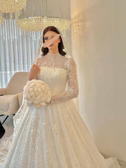 Illusion Long Sleeve Beaded Ball Gown Wedding Dress