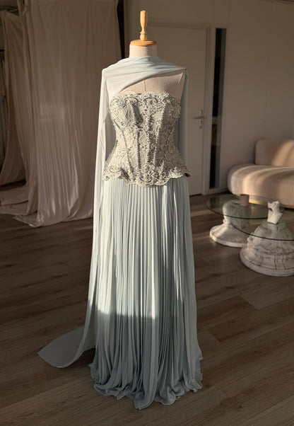 Pleated Gown with Embellished Corset and Cape