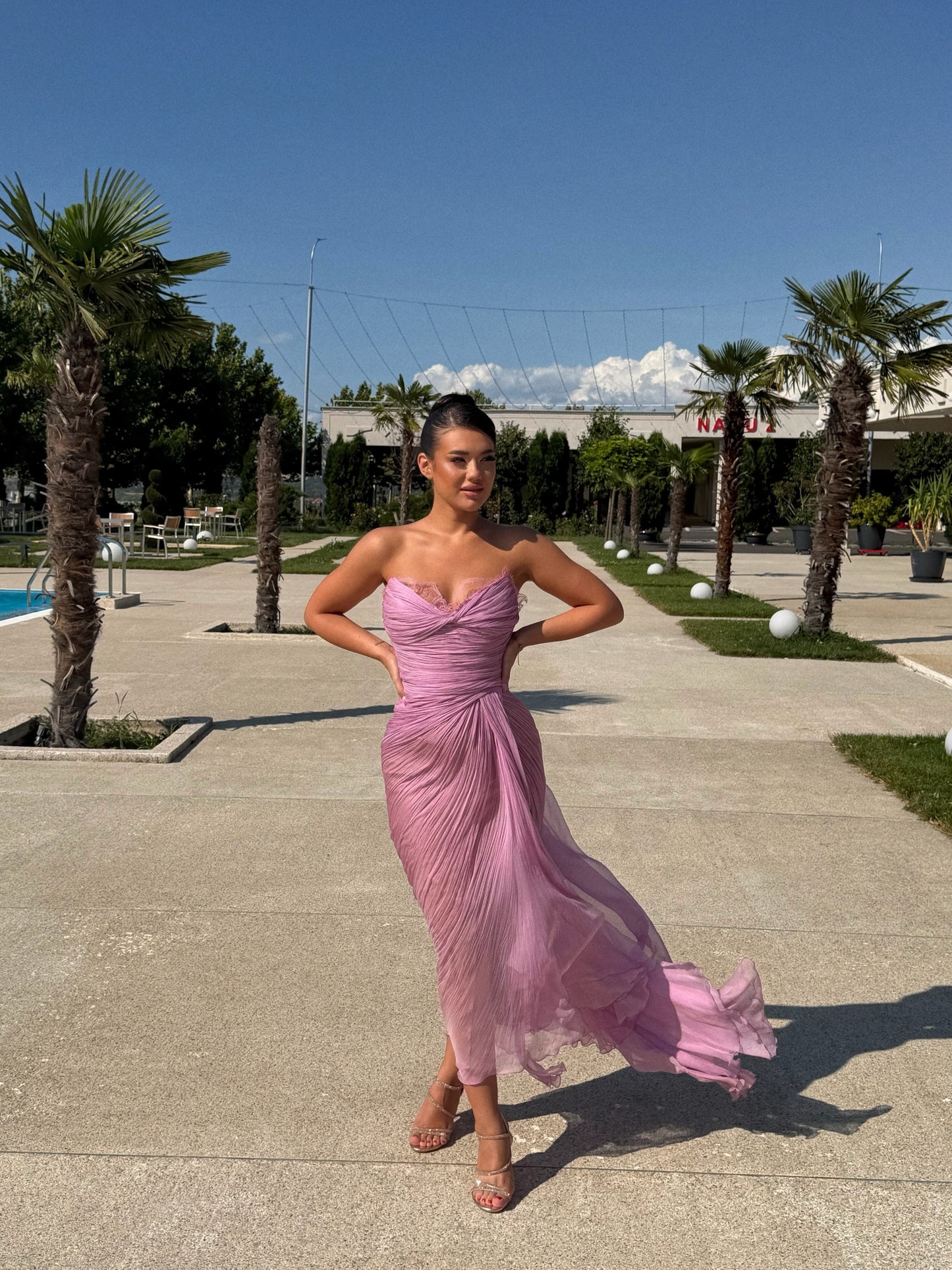 Strapless Pleated Evening Gown with High Slit