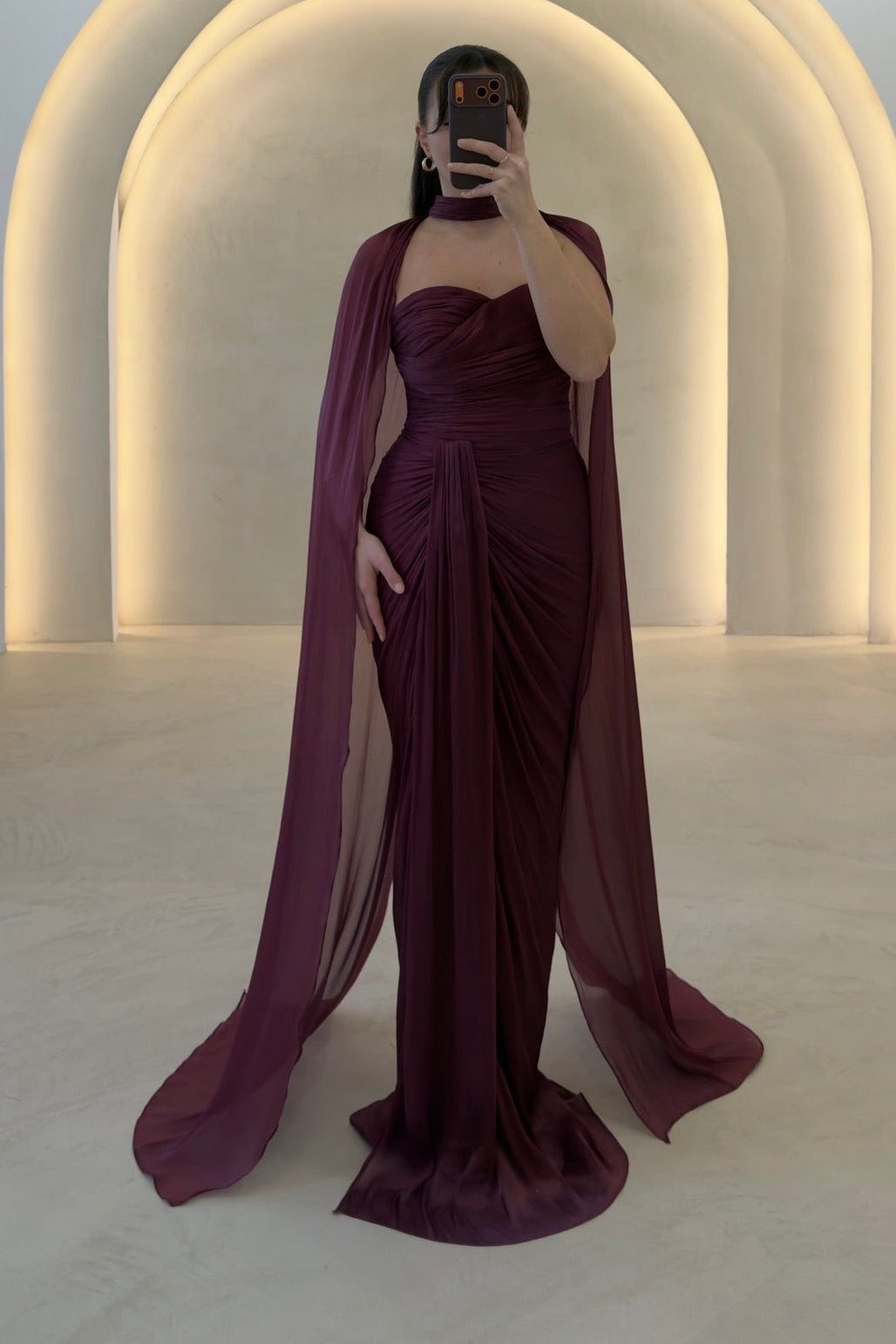 Strapless Ruched Evening Gown with Dramatic Cape