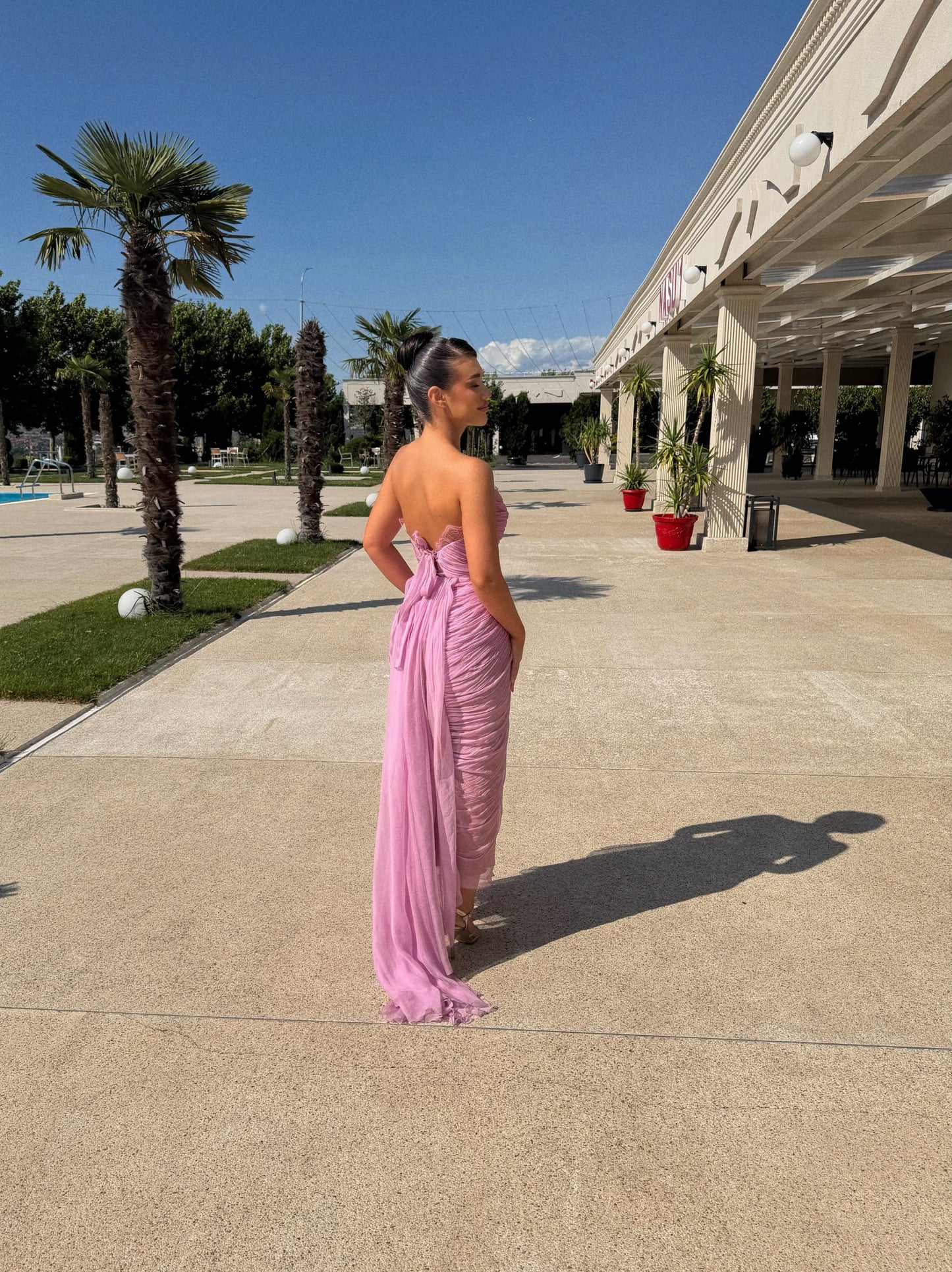 Strapless Pleated Evening Gown with High Slit