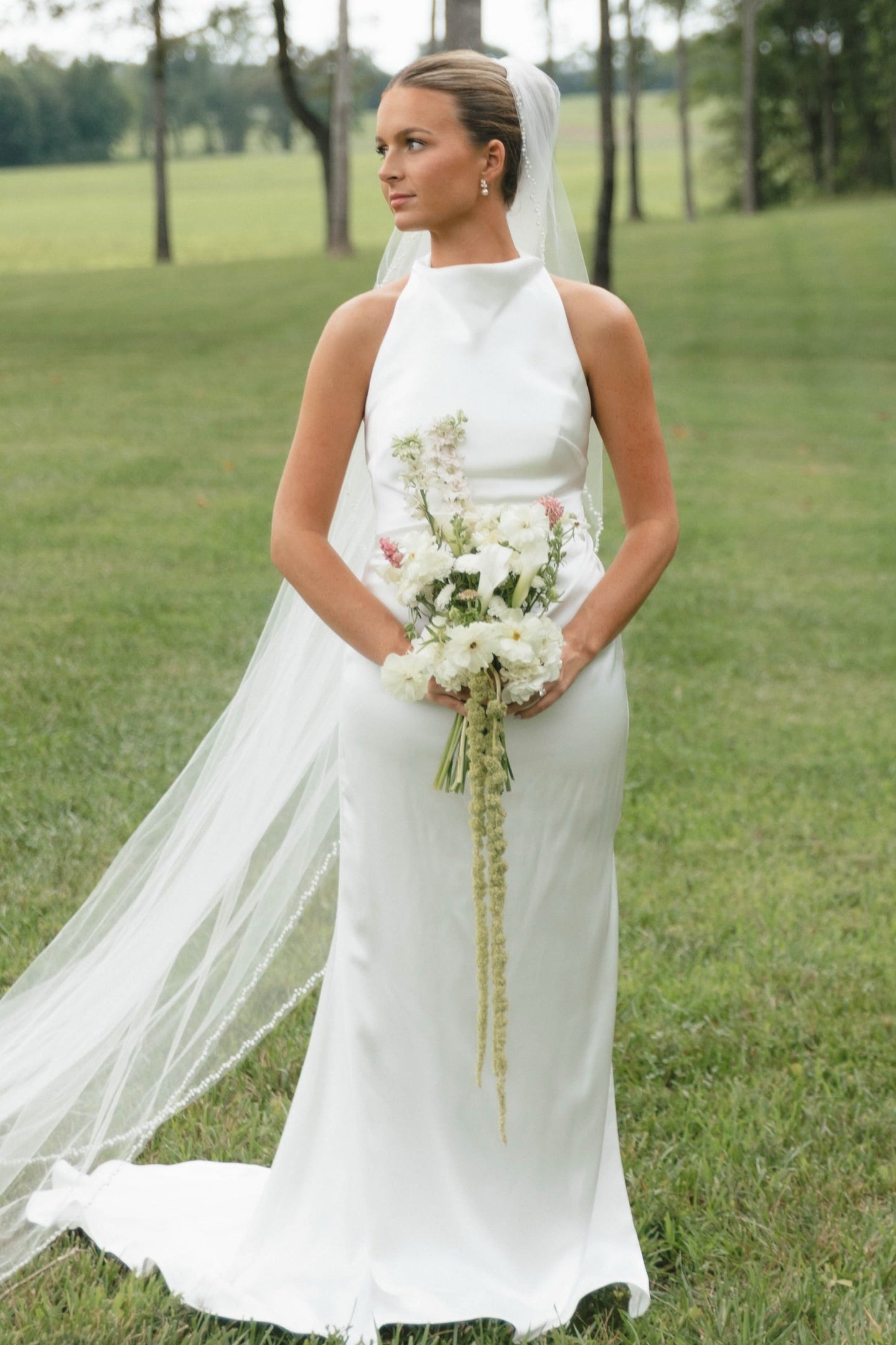 Sleeveless High-Neck Sheath Wedding Gown with Sweep Train